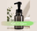 Aloe + Clover foaming hand soap fresh clean green scent in a grey pump bottle